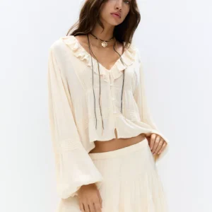 Ruffled mini skirt with lace hem